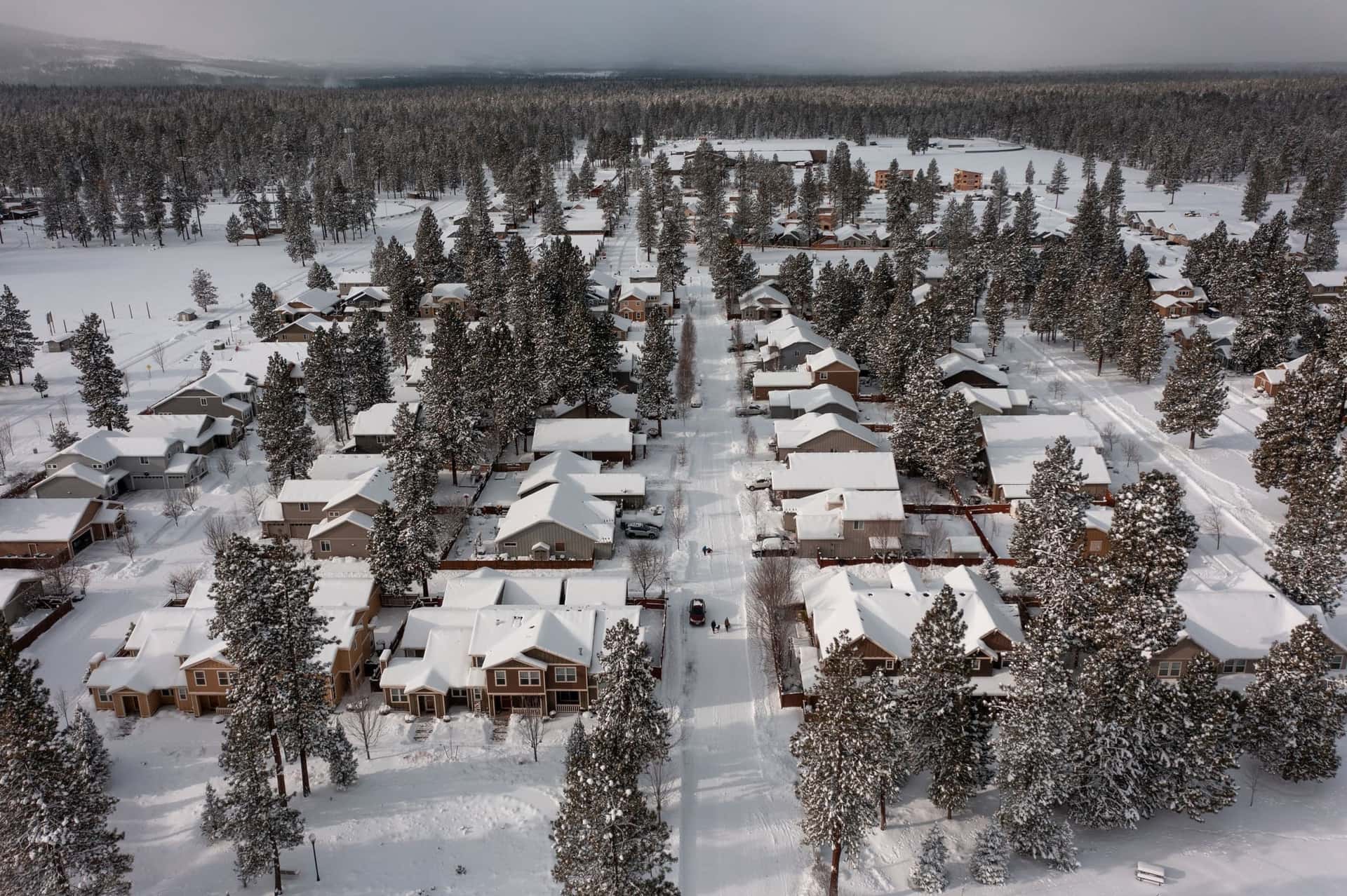Aerial view of a snow-covered Greenlee roof in Central Oregon